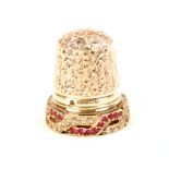 A special commission English silver thimble, the raised frieze set with intertwining bands of
