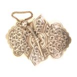 A Russian silver and niello two piece buckle, each half of shaped outline and decorated with leaf