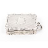 A Victorian silver vinaigrette of shaped rectangular form, engine turned decoration with vacant