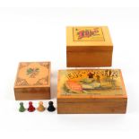 Mauchline ware - three games boxes, comprising (Ex-Bahr/The New Indian Game/F.H. Ayres) with