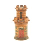 An early 19th Century painted Tunbridge ware turret form scent bottle case in three sections,