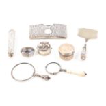 Eight small silver items, comprising a curved open card case, Birmingham 1901, 7.6cm, a cheroot