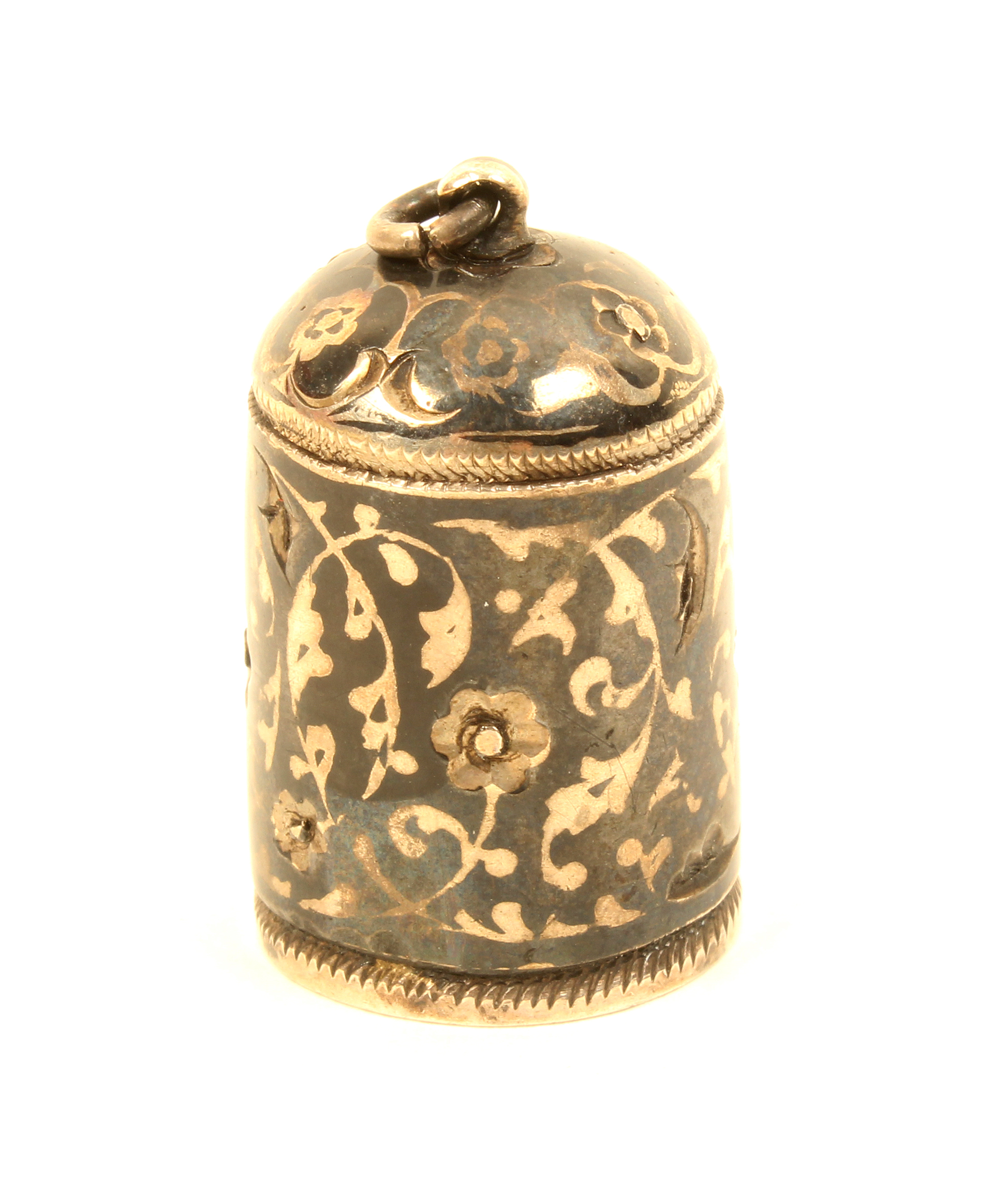 A good 19th Century Armenian niello decorated thimble, with flowerhead recesses and scrolling leaf