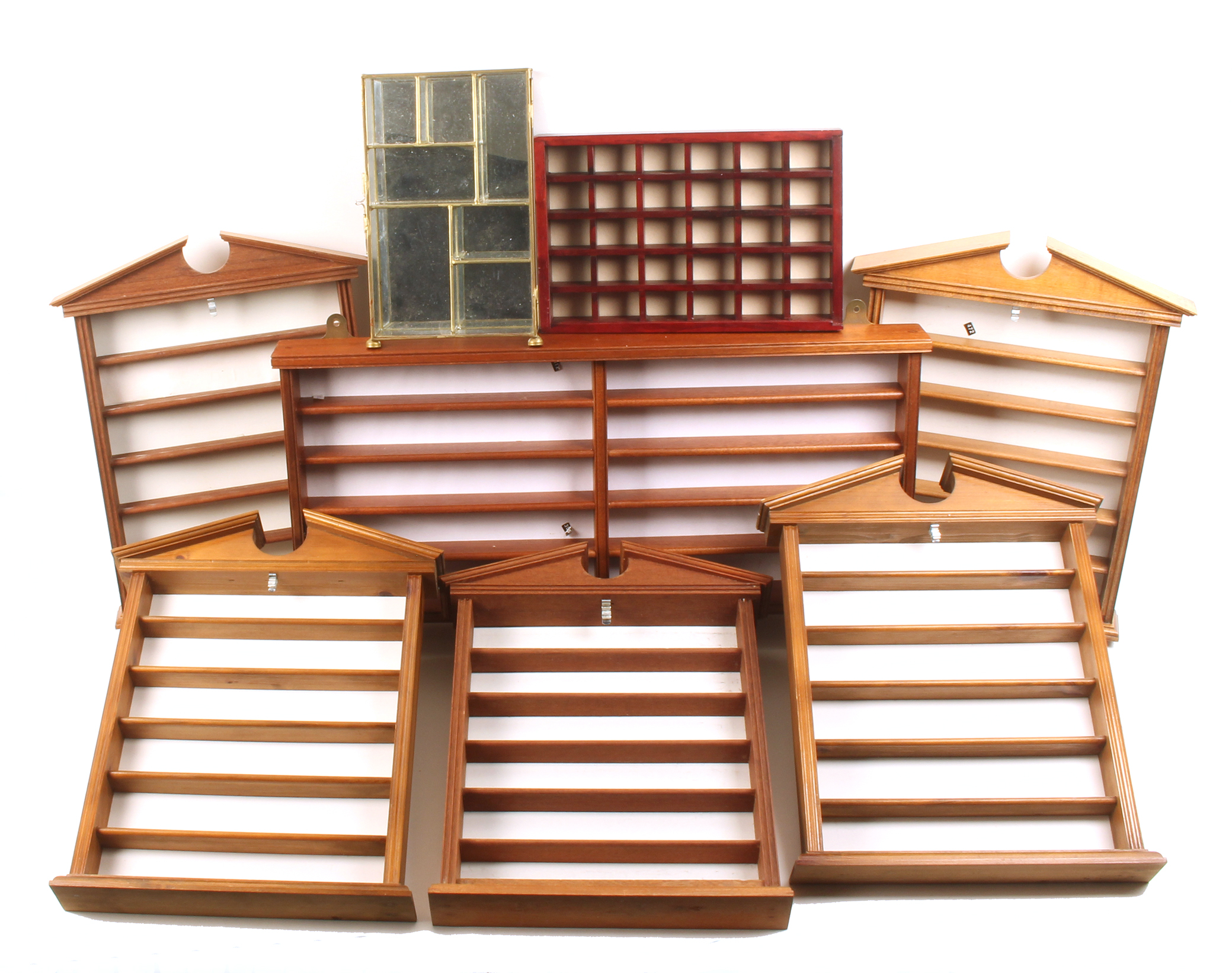 A collection of thimble shelves and cabinets, five with broken pediments, 37.5 x 28.5, another 60