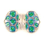 A lady’s silver and enamel waist buckle by Liberty & Co, each half of shaped outline with five