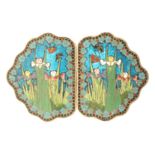 A late 19th Century lady’s cloissone enamel buckle, each half of shaped outline brightly enamelled