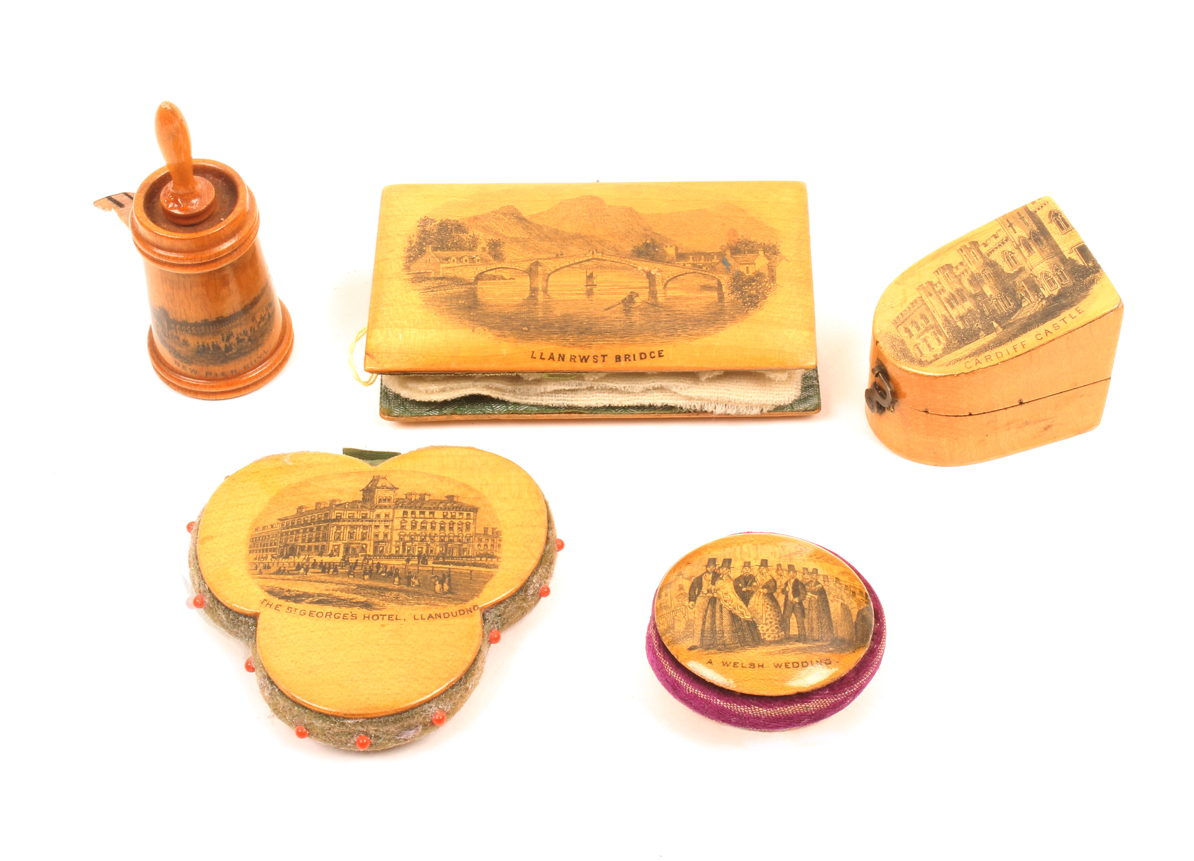 Mauchline ware – sewing – five pieces comprising a slant top bow front thimble case (Cardiff Castle)