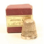 A silver thimble to commemorate the Coronation of Her Majesty Queen Elizabeth II, inscribed ER