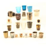 A collection of ‘Just A Thimble Full’ measures and large decorative thimbles, comprising ten