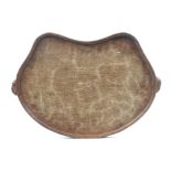 A ‘Mouseman’ Thompson oak kidney shaped tray, raised border and carved with two mice as carrying