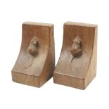 A pair of ‘Mouseman’ Thompson oak bookends, each with swept mouse carved end with adzed sides, 15.