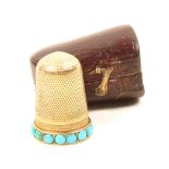 A Victorian gold thimble the frieze set with a continuous band of turquoise coloured stones, with