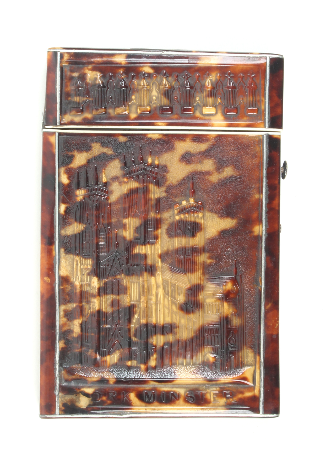 A Victorian pressed tortoiseshell visiting card case each side with a view of York Minster, titled