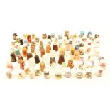 A collection of mostly modern thimbles, glass, ceramic, papier mache and wood. (80+)