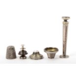 A German silver four piece thimble compendium, 18th Century, the screw off thimble revealing a two
