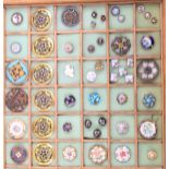 A collection of fifty buttons, late 19th Century/ early 20th Century comprising floral and figural