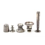 A German silver four piece thimble compendium, late 18th Century, the screw off thimble engraved