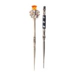 Two crochet hooks comprising a silver and steel example, surmounted by a jewelled thistle,