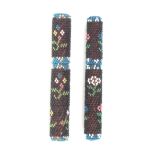 A near pair of 19th Century beadwork covered needlecases of cylinder form, one with wooden core