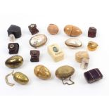 Seventeen thimble cases mostly with thimbles comprising three egg form examples, two in mother of