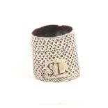 An 18th Century English silver sewing ring for a child initialled SL (From the collection of the