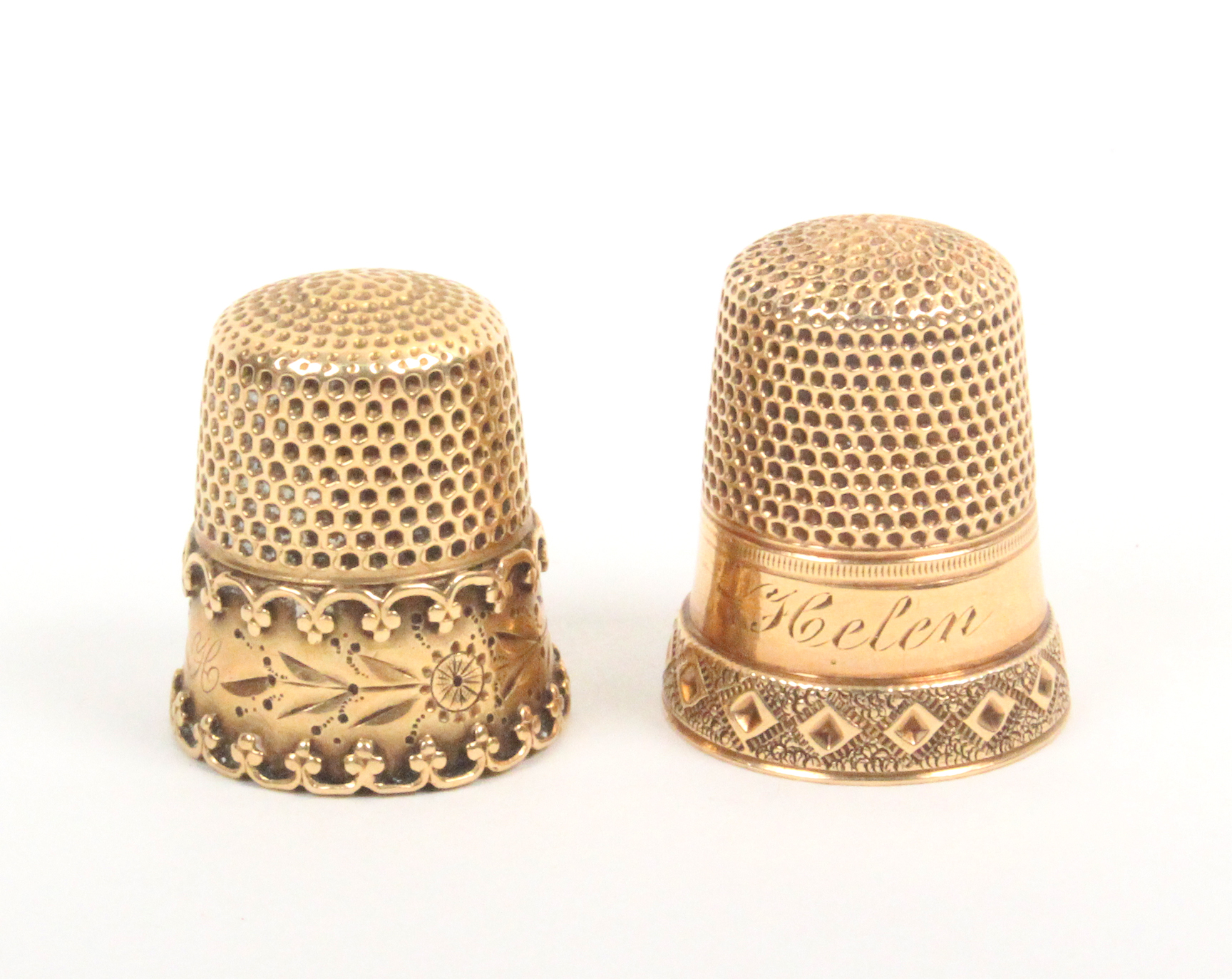 Two American gold thimbles one engraved ïHelenÍ the other initialled ïHÍ (2)