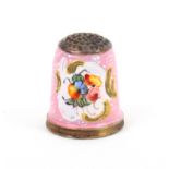 An 18th Century South Staffordshire enamel thimble, the pink ground with two white recessed panels