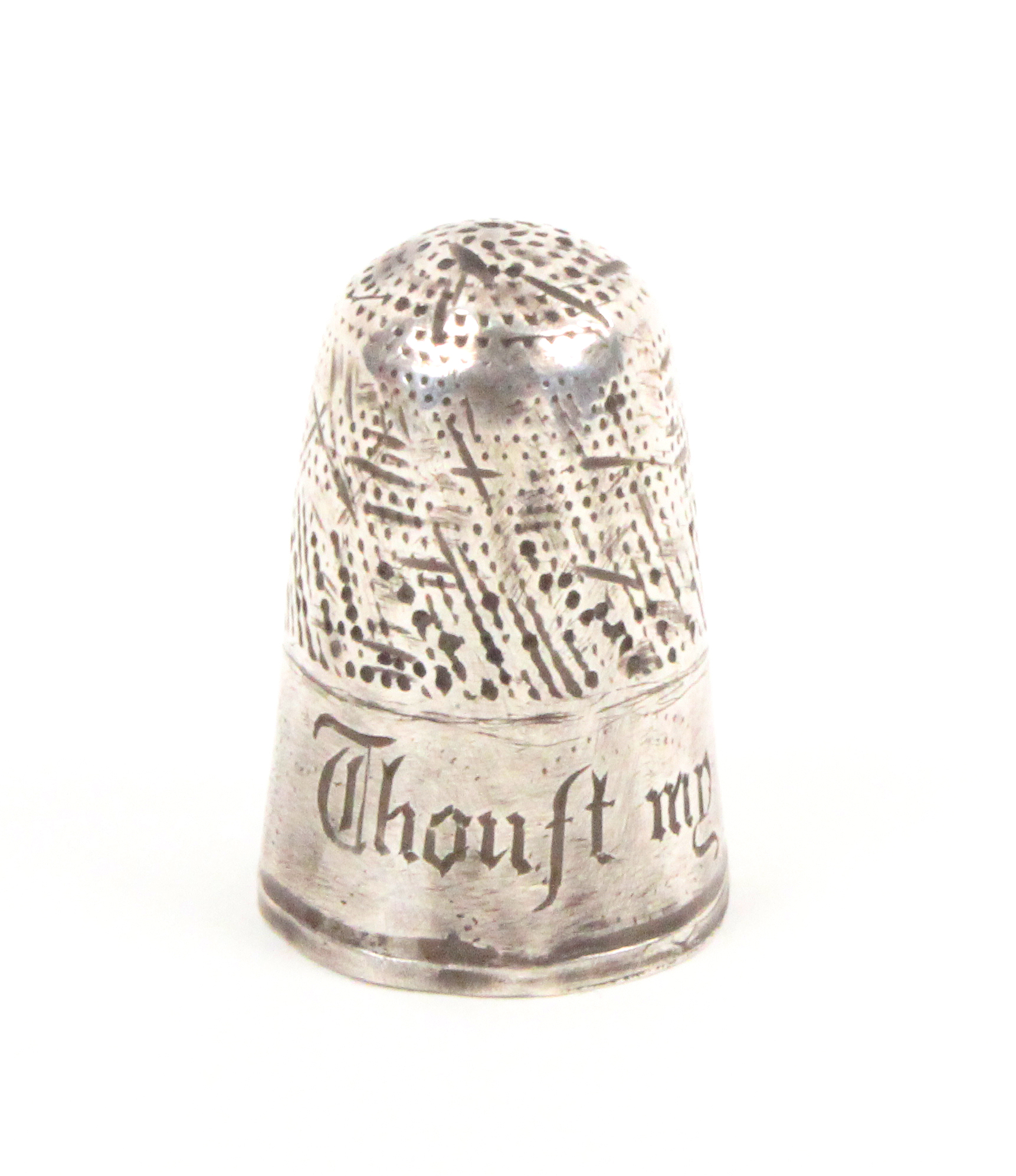 A 17th/18th Century English silver thimble the plain frieze engraved ïThouft my love in hertÍ, wear,