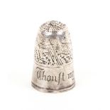 A 17th/18th Century English silver thimble the plain frieze engraved ïThouft my love in hertÍ, wear,