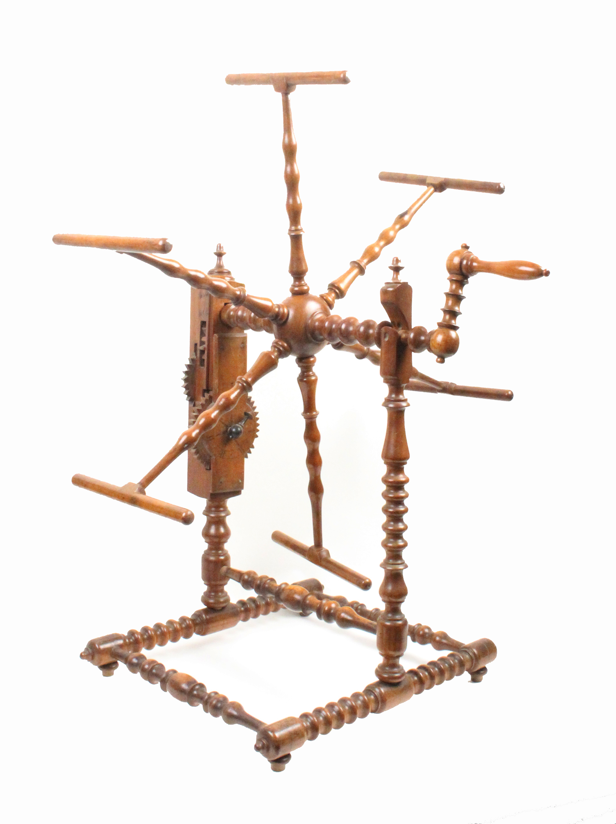 An early 19th Century walnut or fruitwood wool winder the bobbin turned frame on four bun feet - Image 2 of 2