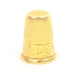 A gold thimble, French, the frieze engraved with leaves and initialled ïAÍ below a coronet (From the