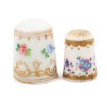 Two 19th Century English porcelain thimbles comprising an example painted with a band of colourful