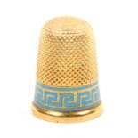 A 19th Century gold thimble with a pale blue enamel Grecian key frieze over a plain rim (From the