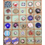A collection of thirty seven buttons, late 19th Century/ early 20th Century comprising floral and