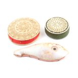 Three pin cushions, comprising a shell example in the form of a fish with velvet backing, the eye