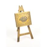 An Avery brass needle packet case Easel, flower basket to folio, stamped to reverse ïBaggallays