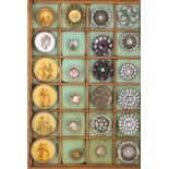 A collection of twenty four buttons, late 19th Century/early 20th Century, including a set of four