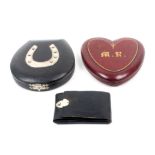 Three late 19th Century small format sewing companions comprising a black leather horseshoe shaped