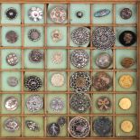 A collection of thirty six buttons, 19th Century and early 20th Century comprising cut steel, enamel