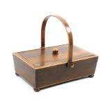 An early 19th Century rosewood and boxwood line inlaid sewing basket of rectangular form, single lid