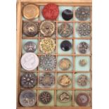 A collection of twenty four buttons 19th Century/early 20th Century mostly metal including a cut