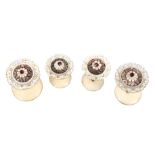 Four unusual reel holders each with carved and pierced mother of pearl top centered by a carved dome