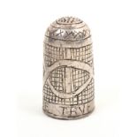 A 17th Century English silver thimble, the body with diamond and oval motifs over a scratched