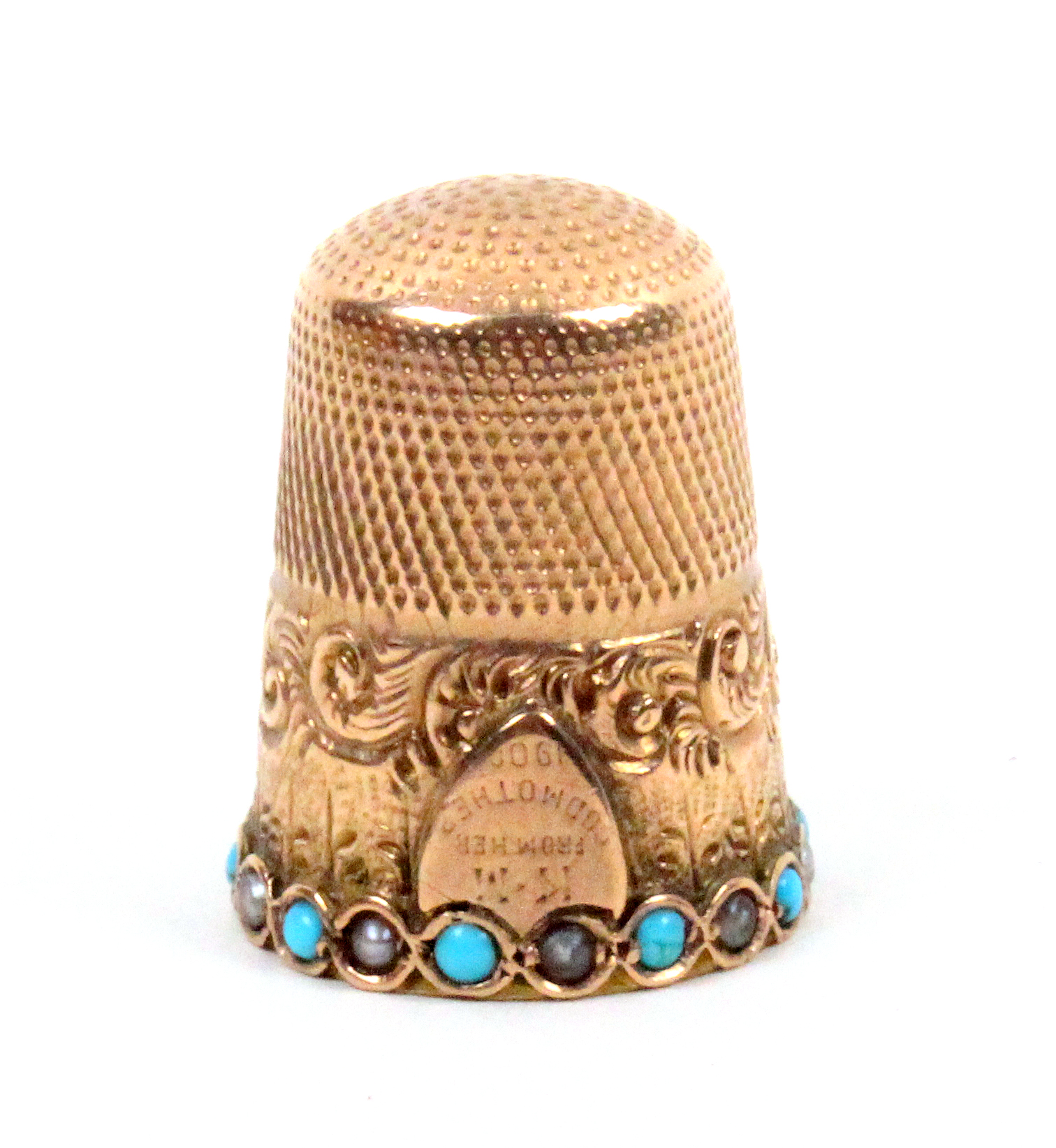 A gold thimble dated 1900 the broad freize with a shield cartouche engraved ïKM From Her God