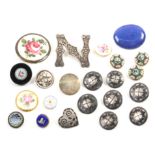 A collection of twenty two buttons comprising a white metal example ïNÍ, 3.8cm, three silver