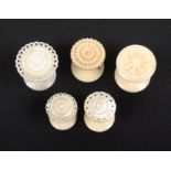 Five various 19th Century reels comprising two variant carved ivory top examples and three with