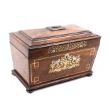 A mid 19th Century rosewood tea caddy of sarcophagal form the front inlaid with cut and engraved