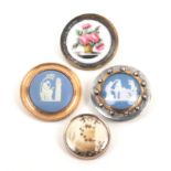 Four late 18th Century/early 19th Century buttons comprising a Wedgwood Jasper ware style example