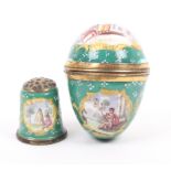 A South Staffordshire gilt metal mounted enamel thimble holder and thimble, circa 1800, of egg form,