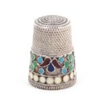 A Russian silver and cloissone enamel thimble, with a frieze of colourful motifs over a white dot